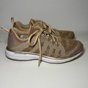 APL women’s gold sparkling pro knit propulsion lab lace up sneakers in size 9